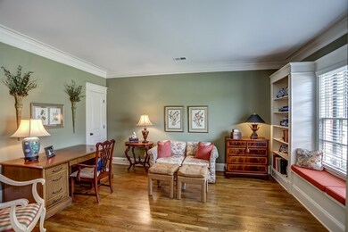 Thick crown molding plus decorative door and windo