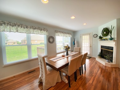 Breakfast area that leads out to the back deck and the screened in porch. 