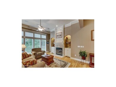 Elegant great room with tall ceilings and gas fire