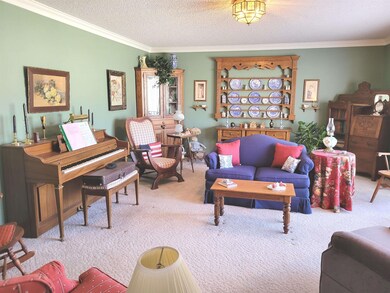 This large living room has lots of natural light. 