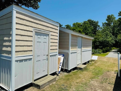 Two sheds convey