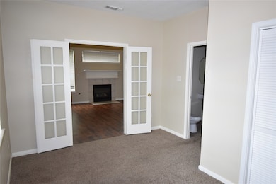 The bedroom on the first floor.  Attached is a 1/2 bathroom, 4 bedroom, 2.5 baths, Klein Schools, 21147 Covington Bridge Dr., Spring, Tx 77338