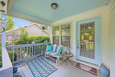 Wooden deck featuring a porch