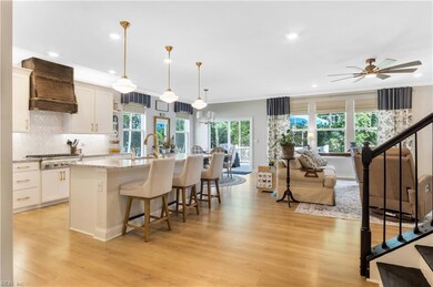 Open concept living takes in the water views.