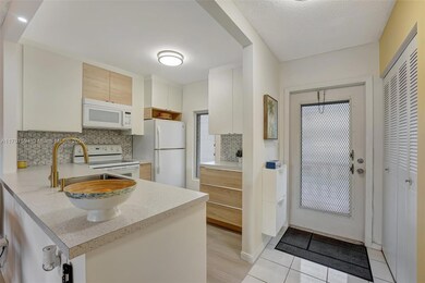 4451 NW 16th St unit K204, Lauderhill, FL 33313 - photo 3