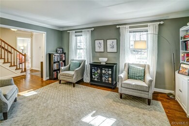 The large Living Room features wide cased openings to both the Foyer and Dining Room allowing for great flow.