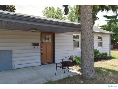 Exterior Side View. Front Door is actually on the 