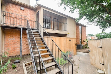 This photo shows the exterior of a two-story brick