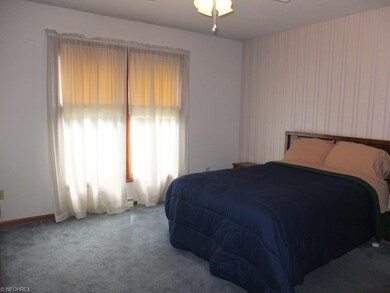 Master suite with walk in closet.
