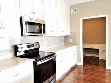 Kitchen - View into the Command Center/Office. Pic