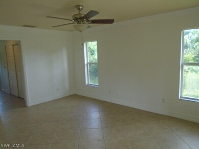 709 Oro Ave S, Lehigh Acres, FL 33974 - photo 6