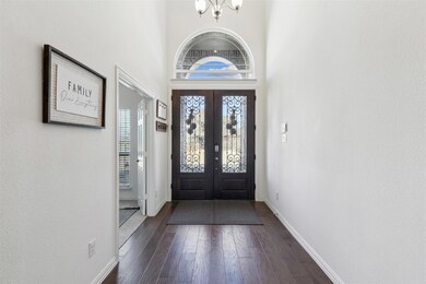 Entryway with dark hardwood / wood-style floors, a