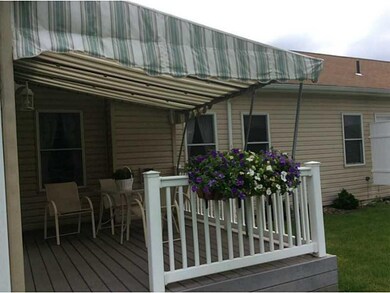 Patio/Deck. Beautiful rear deck w/ awning