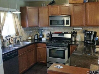 Kitchen with all the appliances and granite counte