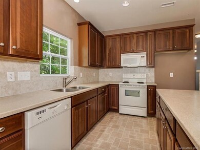 Kitchen is the heart of this home, where ample che