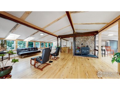 Wood stove can heat up the entire upstairs, with a fan to help heat the lower level