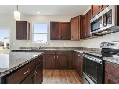 1416 SW Cornwall Rd, Raymore, MO 64083 - photo 7