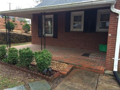 Check out the wonderful brick patio, and come insi