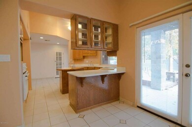 Kitchen w patio doors on right