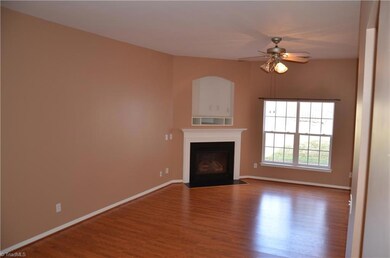 Nice laminate flooring and view of backyard in great room.
