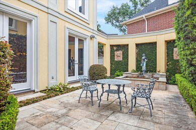A private courtyard and fountain invite you to sit