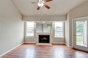 Living area has fireplace & laminate wood floors