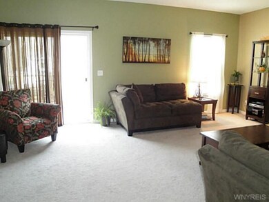 Family Room. Family Room Also Features a Sliding D
