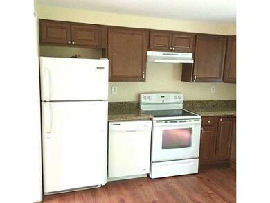Kitchen. The left side unit kitchen has granite co