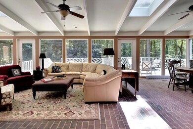 Sunporch, brick floors, shylights, Large Deck over