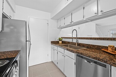Kitchen featuring a sink, appliances with stainle