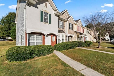 View of property featuring a front yard