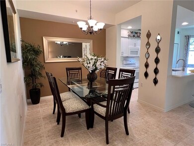 Dining space featuring a notable chandelier, light