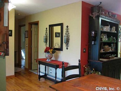 Foyer. Entry door is to the back and left, this is