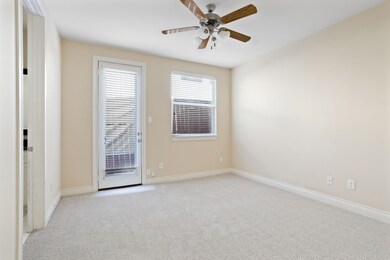 1st floor bedroom opens up to small back patio are