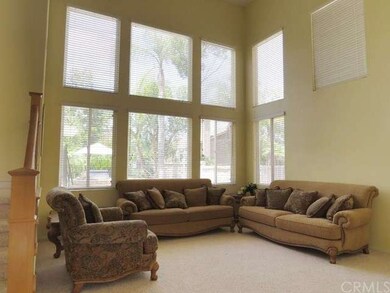 Light and bright two story living room off entry.