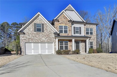 View of front of home featuring a garage
