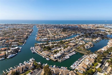 Drone shot from above the property showing proximity to Huntington Harbour.