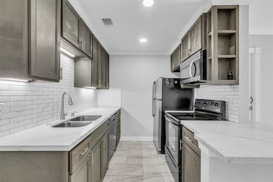 7402 Alabonson Rd unit 301, Houston, TX 77088 - photo 4