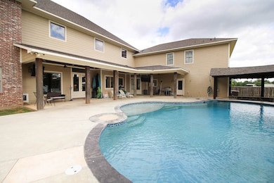 Huge covered patio overlooking the pool