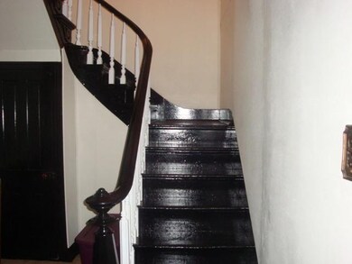 Entry/Foyer. Spiral Staircase leads to upstairs