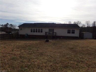 View of back deck and large back yard