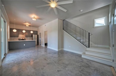 Steps lead to two second floor bedrooms.
