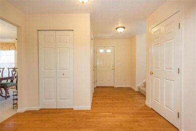 Large entry hall with beautiful hardwood flooring!