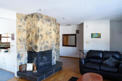 Living Room With Wood Burning Fireplace