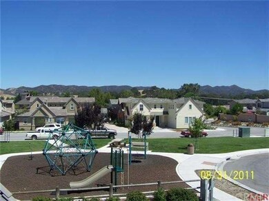 Play equipment at community park  View of foothill