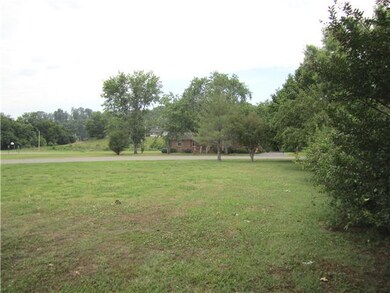 Looking toward the Curve at the Corner of this lot