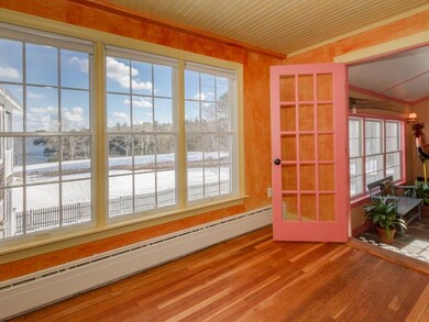Gleaming hardwood floors and large...
