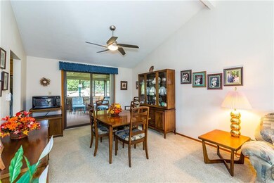 DINING ROOM 12X12:  Beamed Cathedral ceiling opens