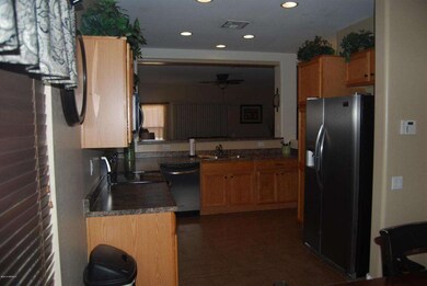 Kitchen with breakfast bar to great room
