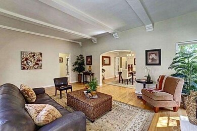 Living room flows to dining room, kitchen and sun 